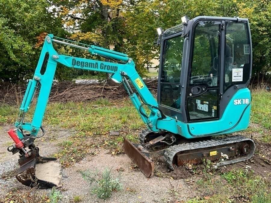 2017 Kobelco SK18 excavator with machine trailer and attachments